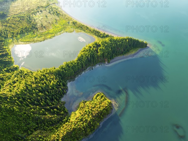 Lagoa do Fogo Lake on Sunny Morning. Green Lush Hills and Forest. Azores, Sao Miguel Island.