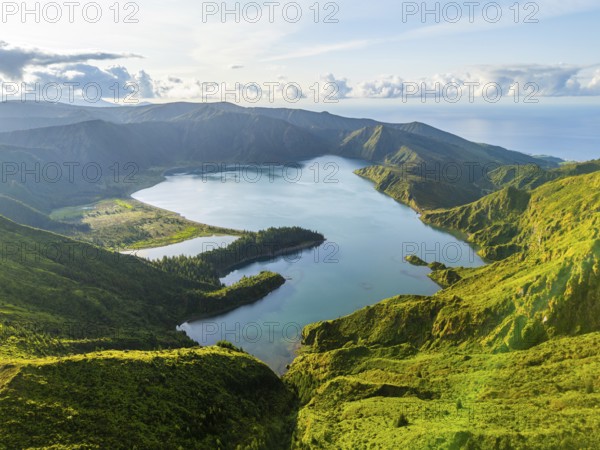 Lagoa do Fogo Crater Lake at Sunrise. Green Lush Hills and Mountains. Azores, Sao Miguel Island.