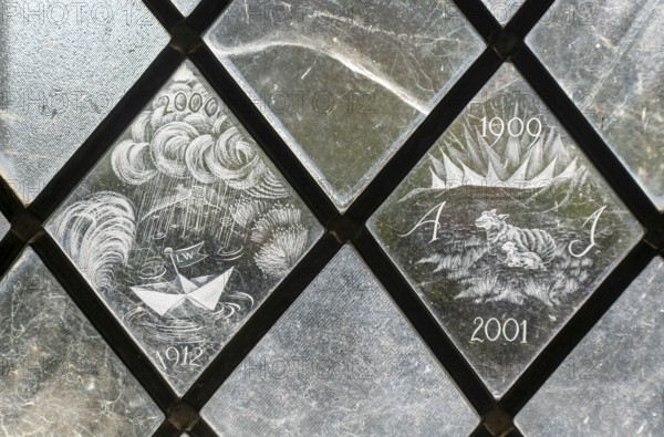 Glass engraved memorial panes, St Mary's church, Alton Barnes, Wiltshire, England, UK designed by