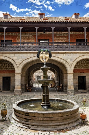 Historic courtyard with decorative fountain and arcades, The courtyard with fountain in the museum