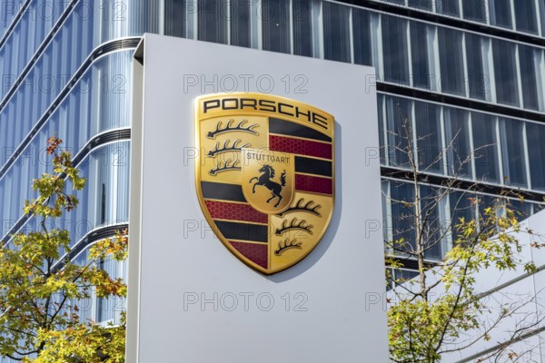 Porsche Centre Autohaus am Pragsattel. Porsche Design Tower skyscraper. Logo on a stele. Stuttgart,