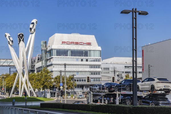 Porscheplatz with Porsche headquarters. Inspiration 911 artwork by Gerry Judah: three steles, each