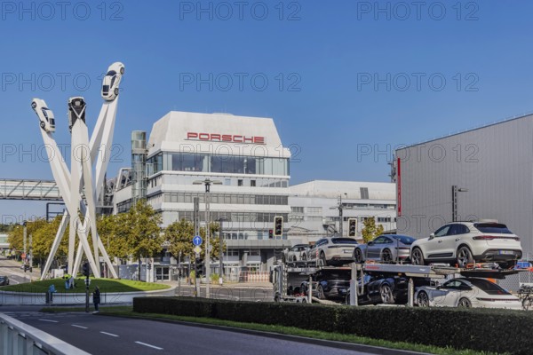 Porscheplatz with Porsche headquarters. Inspiration 911 artwork by Gerry Judah: three steles, each