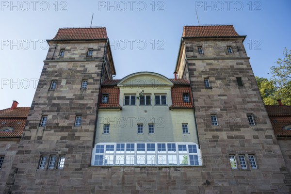 Shaft lock with two towers, red roofs and numerous windows, Minden waterway junction,