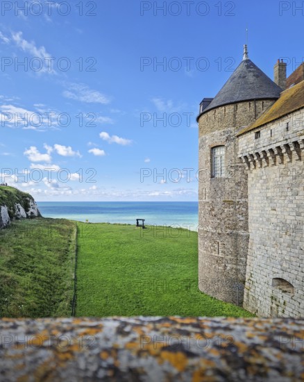 Chateau de Dieppe, a historic fortress perched on a cliff overlooking the turquoise waters of the
