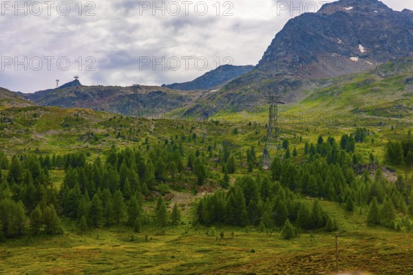 Overhead Cable Car with Mountain View in the Swiss Alps in a Sunny Summer Day in Bernina,