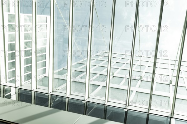 Modern Office Building in Zurich Airport in a Sunny Summer Day with Blue Sky and Clouds in the
