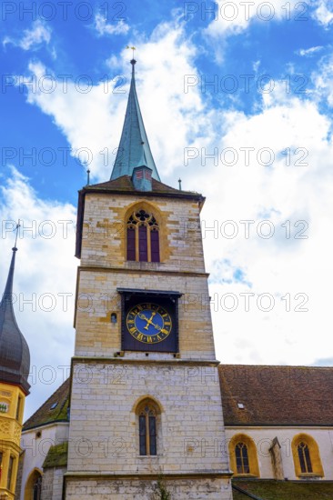 Old Town with House and Clock Tower with Sky and Clouds in a Sunny Autumn Day in City of Biel,