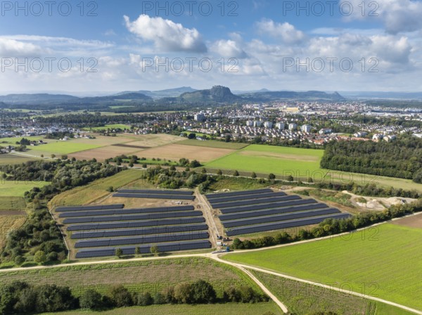 Aerial view, solar modules, solar park, photovoltaics, power generation from solar energy, behind