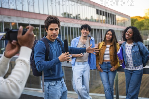 Young diverse students collaborating on a media project, a man holding a boom microphone