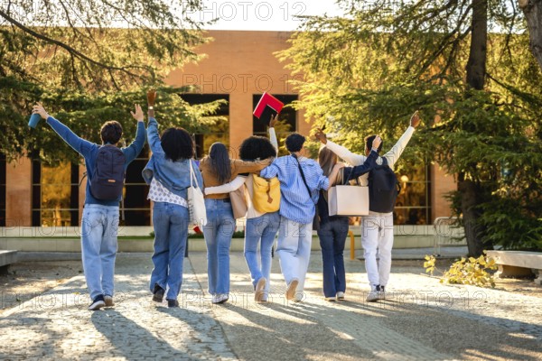 Group of diverse university students walking together on campus, embracing friendship and
