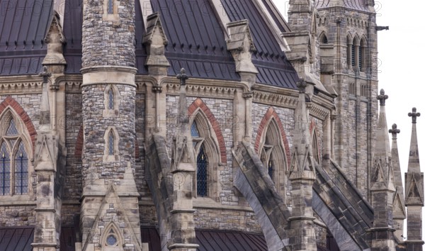 A close-up of the Canadian Parliament Buildings with gothic design and intricate details in Ottawa,