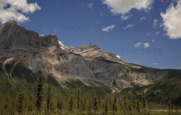 Majestic mountain landscape of the Canadian Rocky Mountains with rugged terrain and expansive