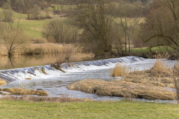 Rural impression at the Jagst river near a small village named Oberregenbach near Langenburg in