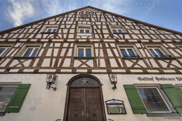 Pointed gable façade with half-timbering, Gasthof Goldener Adler in Kisslegg, Allgäu,