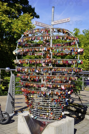 Large arrangement of colourful heart-shaped padlocks on a railing, Nuremberg, Middle Franconia,