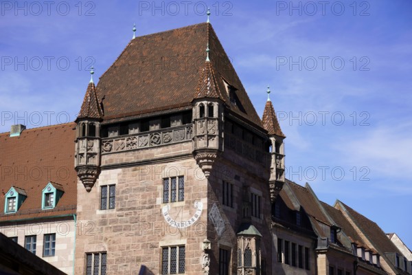 Historic building with oriels and decorations under a blue sky, Nuremberg, Middle Franconia,