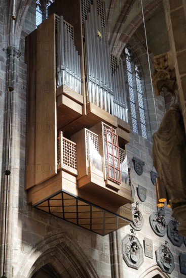 Large organ with wooden panelling and impressive pipes in the church, Church of St. Lawrence,