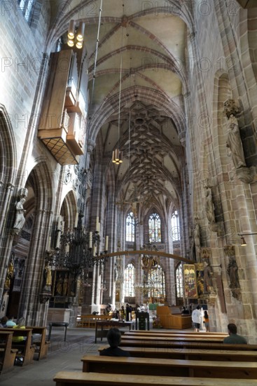 Large nave with impressive Gothic architecture and stained glass windows, St. Lawrence Church,