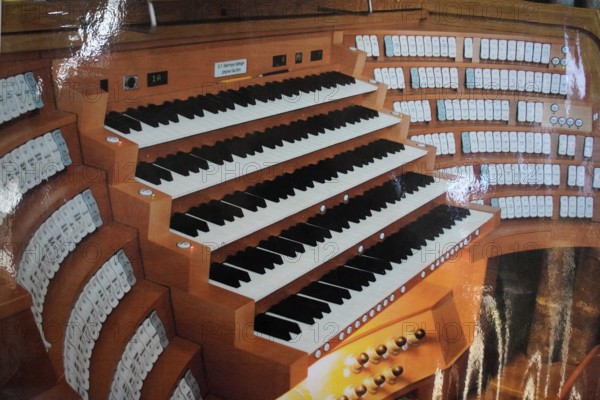 Close-up of a large organ console with numerous stops and manuals, St Lorenz Church, Nuremberg,