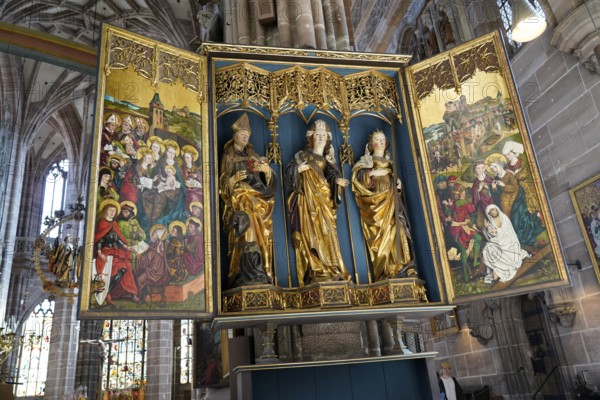 Magnificent altar with detailed figures and gilded decorations, Church of St Lawrence, Nuremberg,