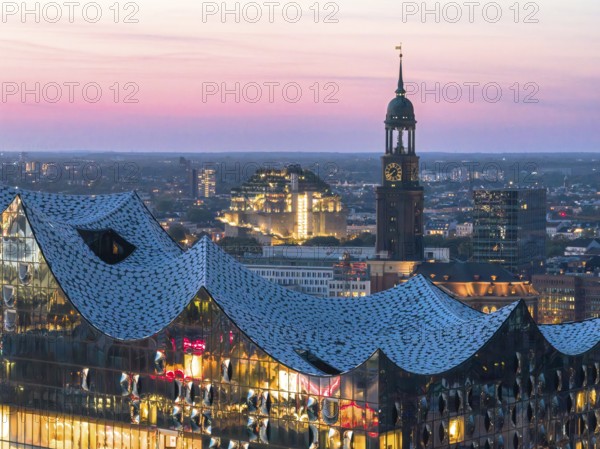 Aerial view of the Elbphilarmonie with St Michael's Church and Hamburg Bunker in the background at
