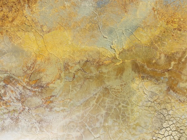 Abstract patterns in a waste pond in the mineral-rich area of the Rio Tinto mines. The colour is