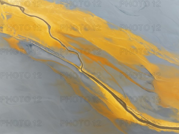 Abstract patterns in a waste pond in the mineral-rich area of the Rio Tinto mines. The colour is