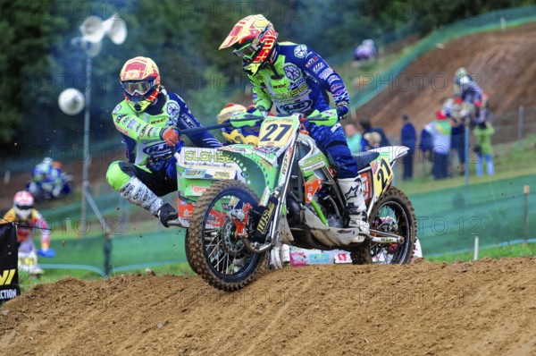 Motocross, Rudersberg, Baden-Württemberg, Germany, Europe, Two riders on a motorbike master a bend