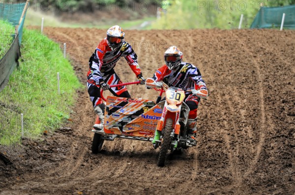 Motocross, Rudersberg, Baden-Württemberg, Germany, Europe, Sidecar motorbike riders ride through a