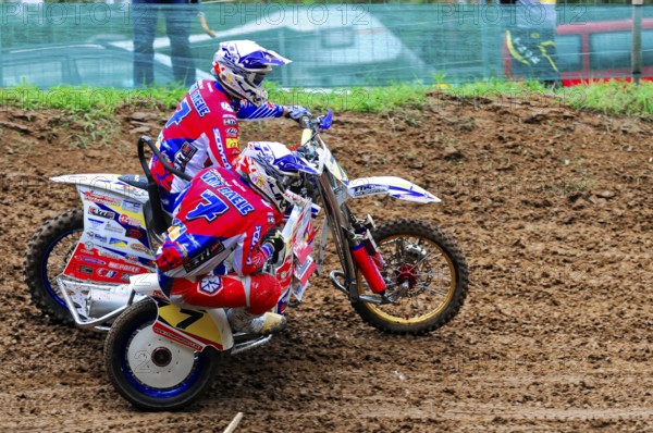 Motocross, Rudersberg, Baden-Württemberg, Germany, Europe, Two riders lean on a sidecar motorbike