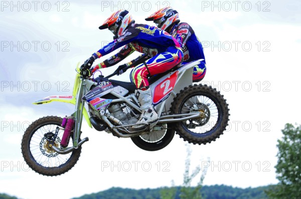 Motocross, Rudersberg, Baden-Württemberg, Germany, Europe, Two motorbike racers in colourful suits