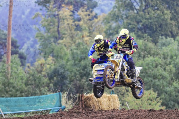 Motocross, Rudersberg, Baden-Württemberg, Germany, Europe, Motocross duo with sidecar jumps into