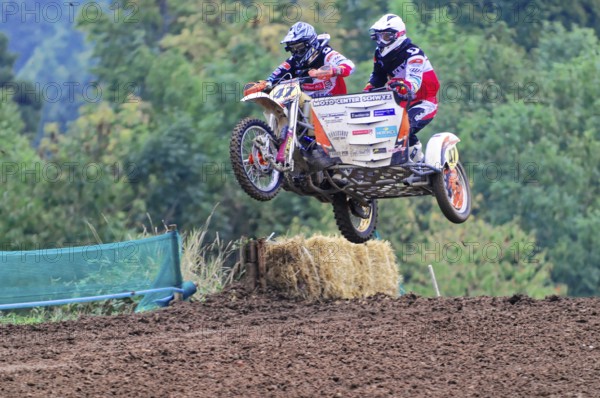 Motocross, Rudersberg, Baden-Württemberg, Germany, Europe, Motocross team takes a leap with sidecar