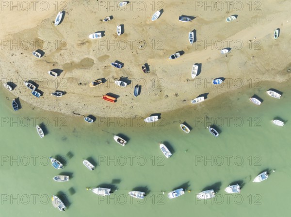 Fishing boats at low tide at the fishing village of Sancti Petri. In the marshland of the Bahía de