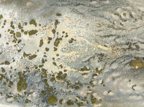 Marshland at low tide. Nature Reserve La Breña y Marismas del Barbate. Aerial view. Drone shot.