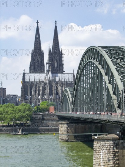 Waterside scenery with cologne cathedral and hohenzollern bridge in Cologne, a city in North
