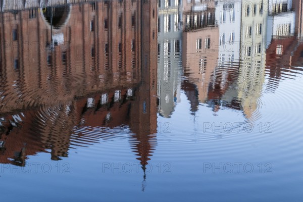 Waterfront promenade with reflection at sunrise in the Old Town, Motlawa River, Gdansk, Gdansk,