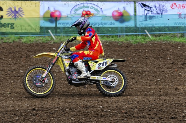 Motocross, Rudersberg, Baden-Württemberg, Germany, Europe, A rider on a yellow motorbike