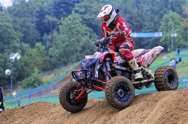 Motocross, Rudersberg, Baden-Württemberg, Germany, Europe, Rider in red protective clothing jumps