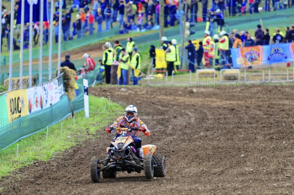 Motocross, Rudersberg, Baden-Württemberg, Germany, Europe, A quad bike pilot navigates through a