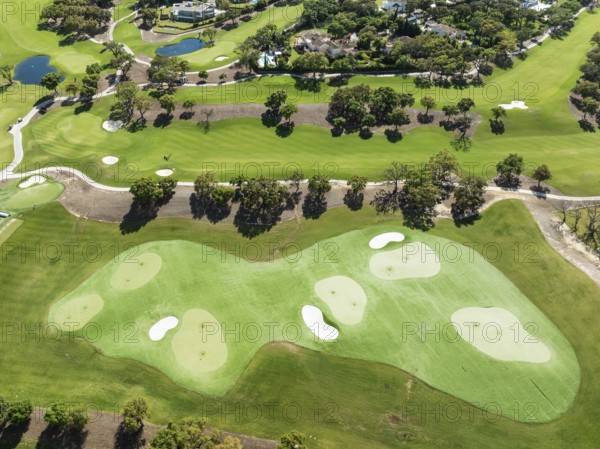 Driving range with greens and bunkers at the San Roque Club Golf Resort. Aerial view. Drone shot.