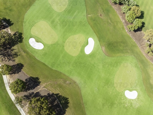 Driving range with greens and bunkers at the San Roque Club Golf Resort. Aerial view. Drone shot.