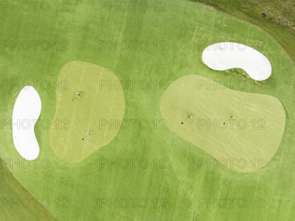 Driving range with greens and bunkers at the San Roque Club Golf Resort. Aerial view. Drone shot.