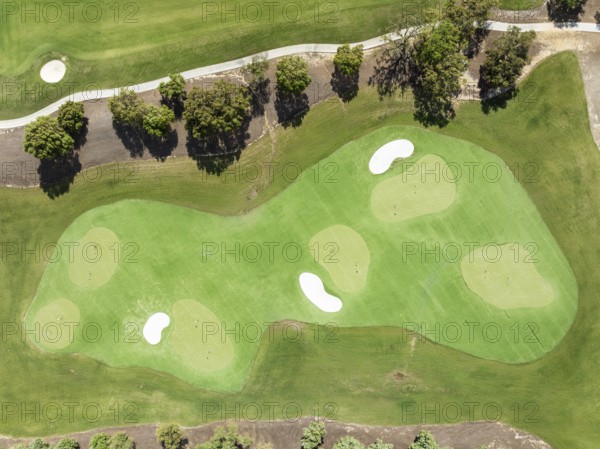Driving range with greens and bunkers at the San Roque Club Golf Resort. Aerial view. Drone shot.
