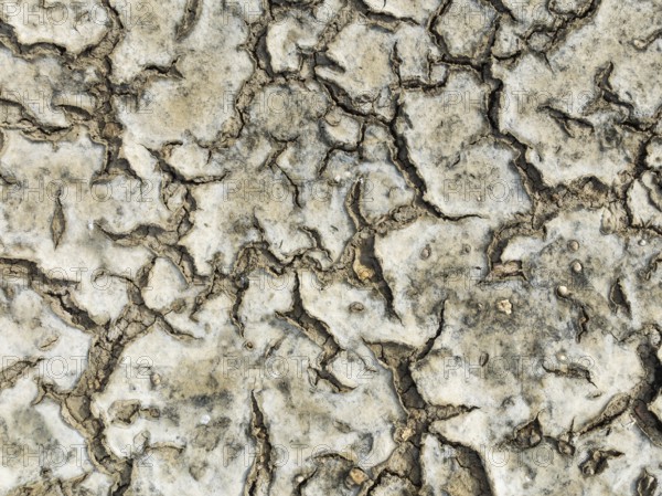 Dried mud in the marshland of the Bahía de Cádiz Nature Reserve. Aerial view. Drone shot. Cádiz