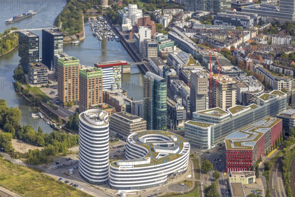 Aerial view, Media harbour on the river Rhine, construction site with construction crane and new