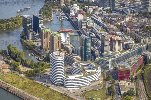 Aerial view, Media harbour on the river Rhine, construction site with construction crane and new