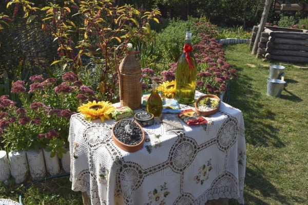 An improvised table with moonshine and sunflower seeds. Snack for vodka. Taman, Krasnodar Krai,