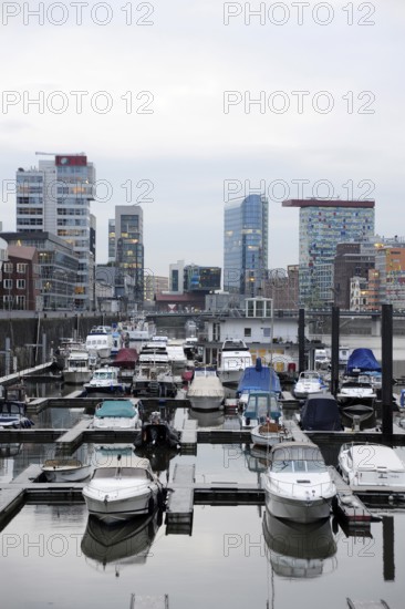 Boats in the customs harbour, modern architecture at the Media Harbour, Düsseldorf, Rhineland,